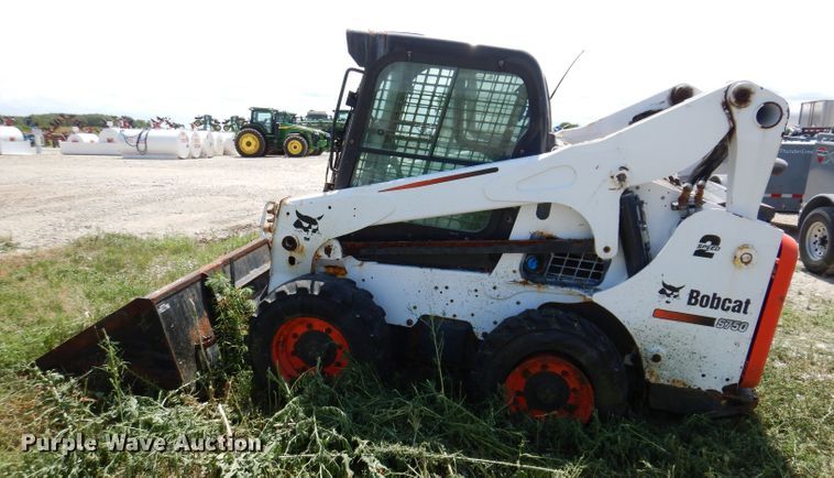image for item KP9503 2015 Bobcat S750  skid steer loader
