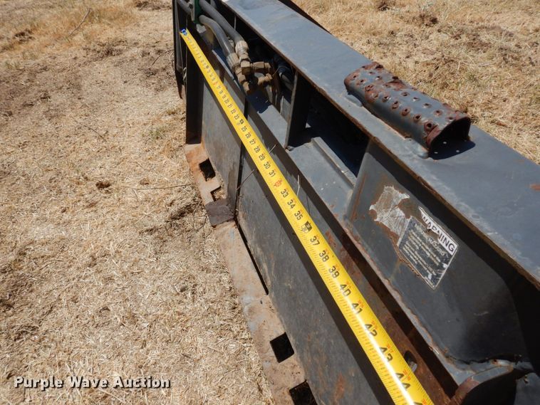 image for item KV9987 Paladin LAF0977-0022  four-in-one skid steer bucket