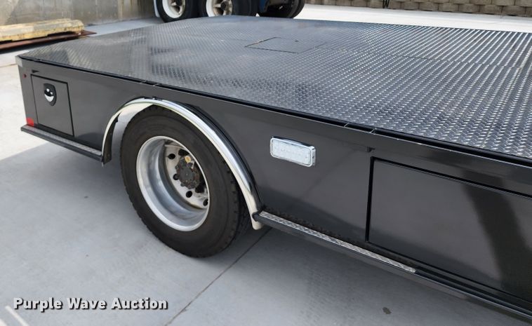 image for item JB9044 2000 International 4700  flatbed truck