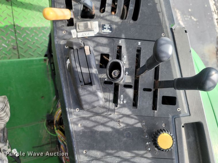 image for item LM9587 2006 John Deere 6415 MFWD tractor