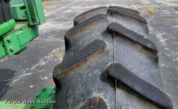 image for item LM9587 2006 John Deere 6415 MFWD tractor