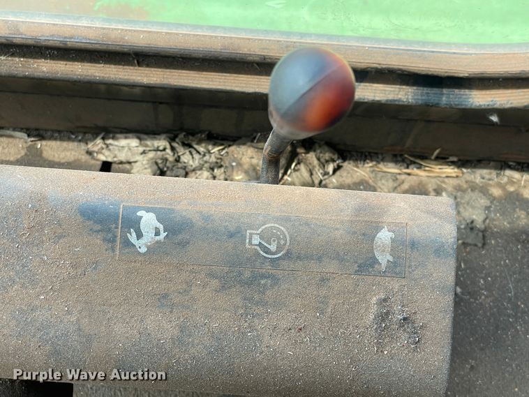 image for item DN5085 1985 John Deere 3830  windrower