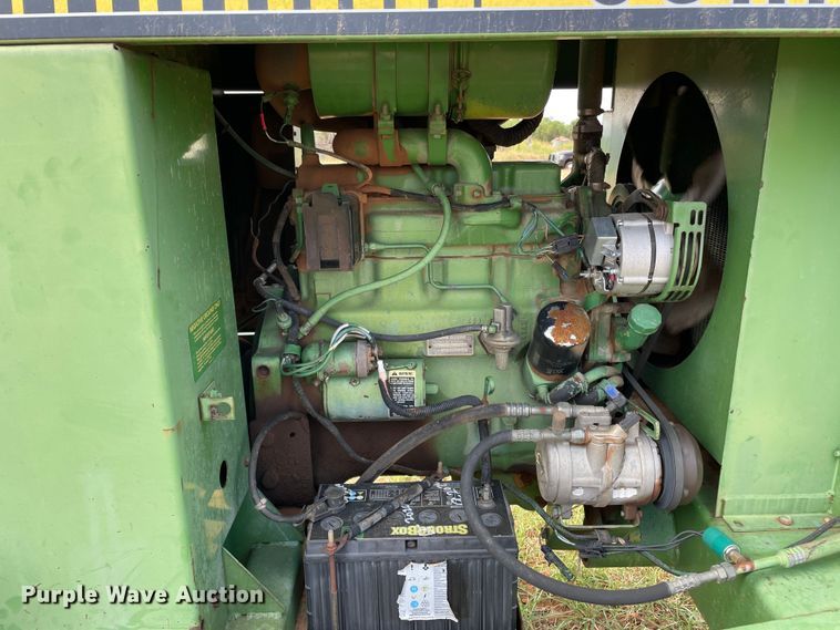 image for item DN5085 1985 John Deere 3830  windrower