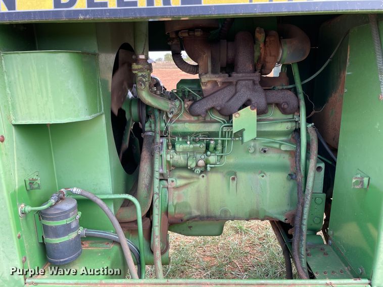 image for item DN5085 1985 John Deere 3830  windrower