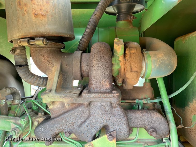 image for item DN5085 1985 John Deere 3830  windrower