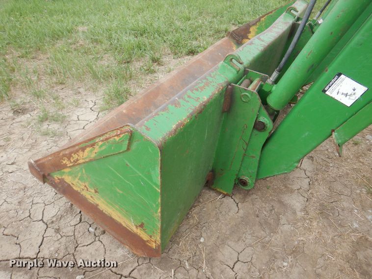 image for item DP5641 1999 John Deere 6410  MFWD tractor