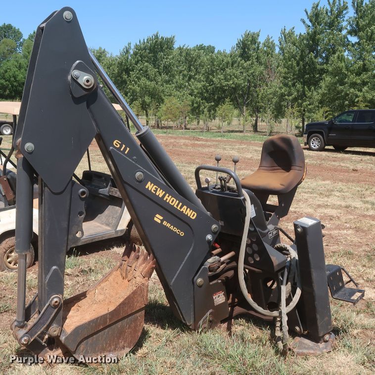 image for item JR9418 New Holland 611  backhoe attachment