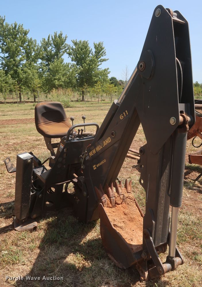 image for item JR9418 New Holland 611  backhoe attachment