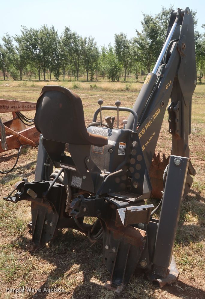 image for item JR9418 New Holland 611  backhoe attachment