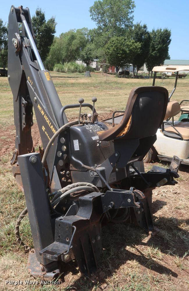 image for item JR9418 New Holland 611  backhoe attachment
