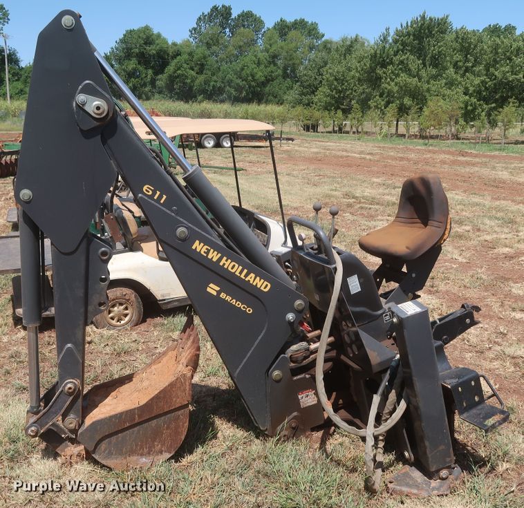 image for item JR9418 New Holland 611  backhoe attachment