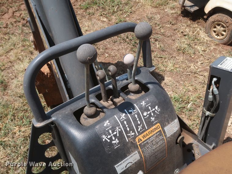 image for item JR9418 New Holland 611  backhoe attachment