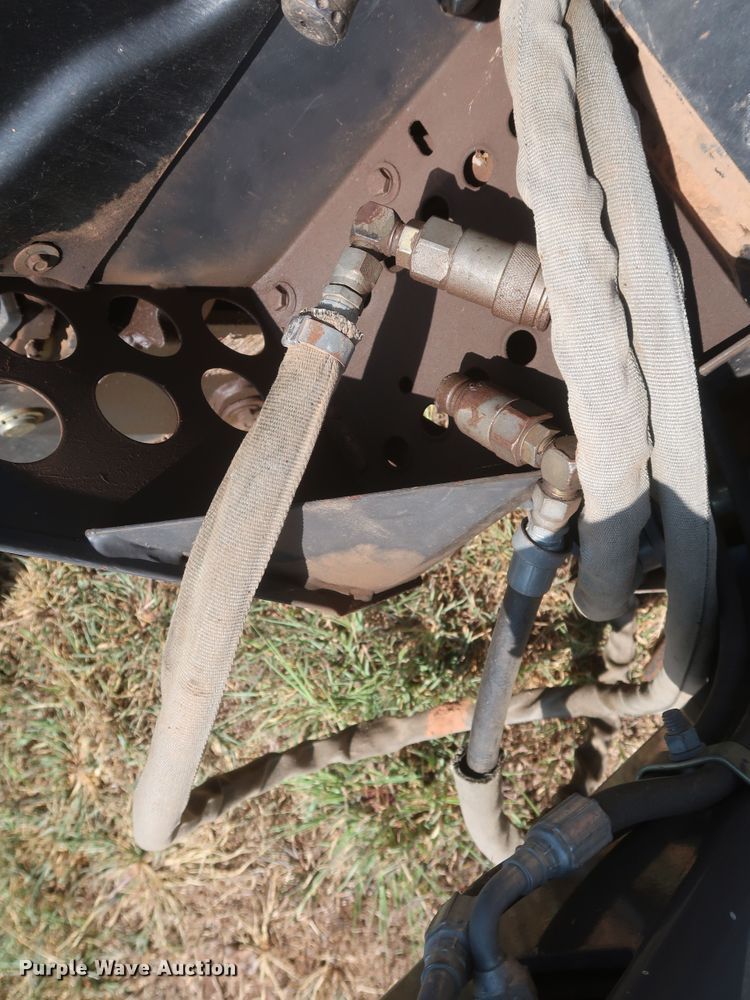 image for item JR9418 New Holland 611  backhoe attachment