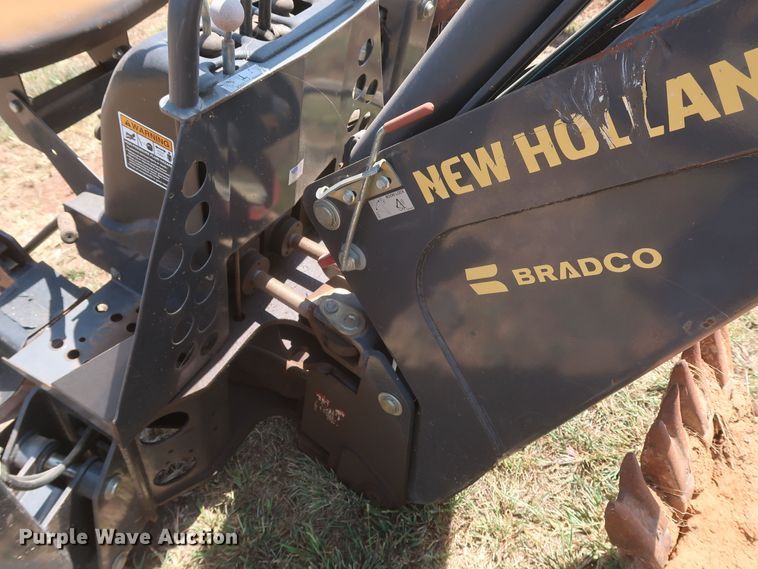 image for item JR9418 New Holland 611  backhoe attachment