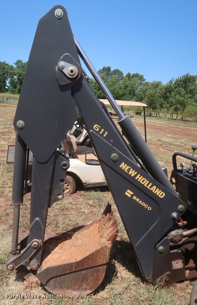 image for item JR9418 New Holland 611  backhoe attachment