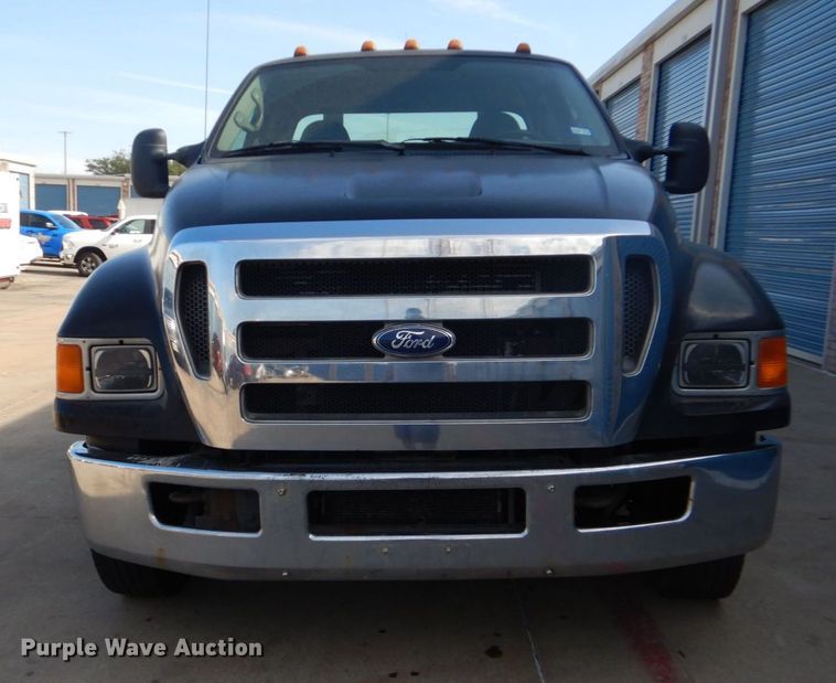 image for item DO1484 2010 Ford F650 Super Duty  SuperCab rollback truck
