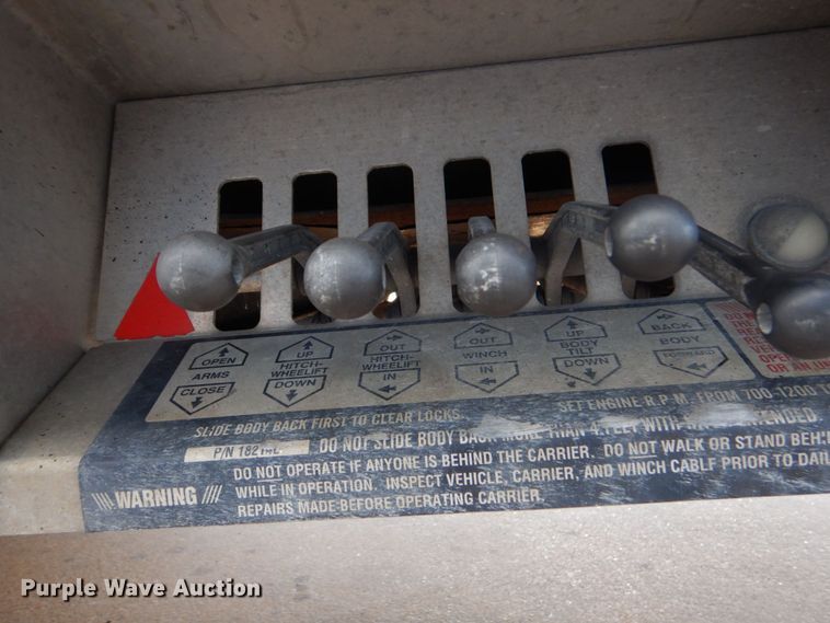 image for item DO1484 2010 Ford F650 Super Duty  SuperCab rollback truck