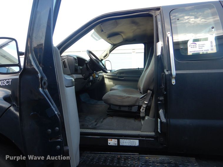 image for item DO1484 2010 Ford F650 Super Duty  SuperCab rollback truck