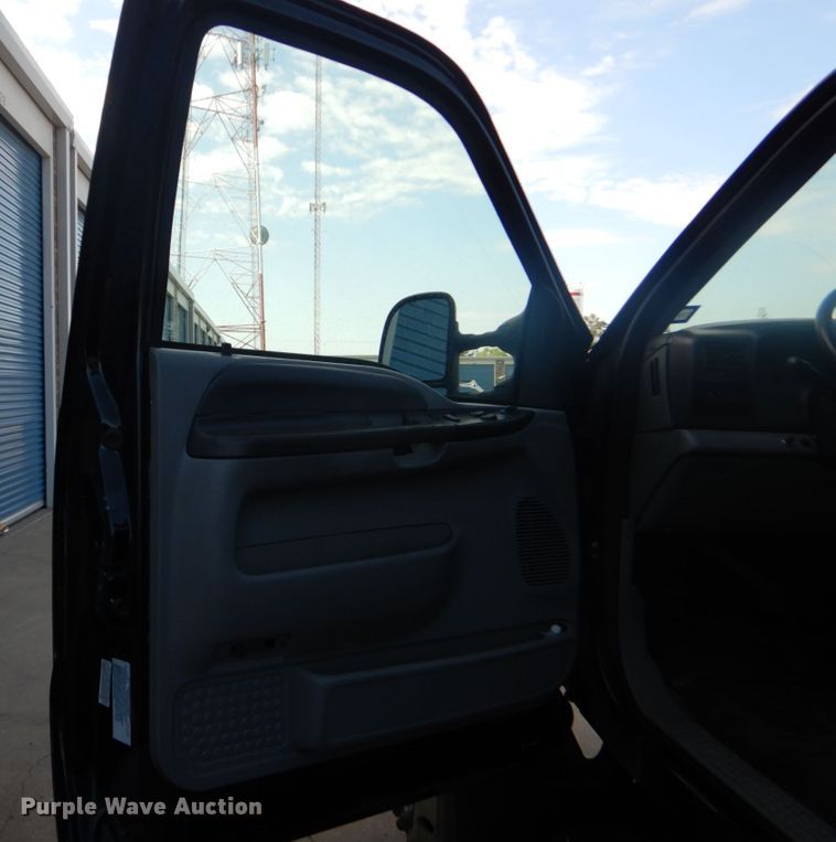 image for item DO1484 2010 Ford F650 Super Duty  SuperCab rollback truck