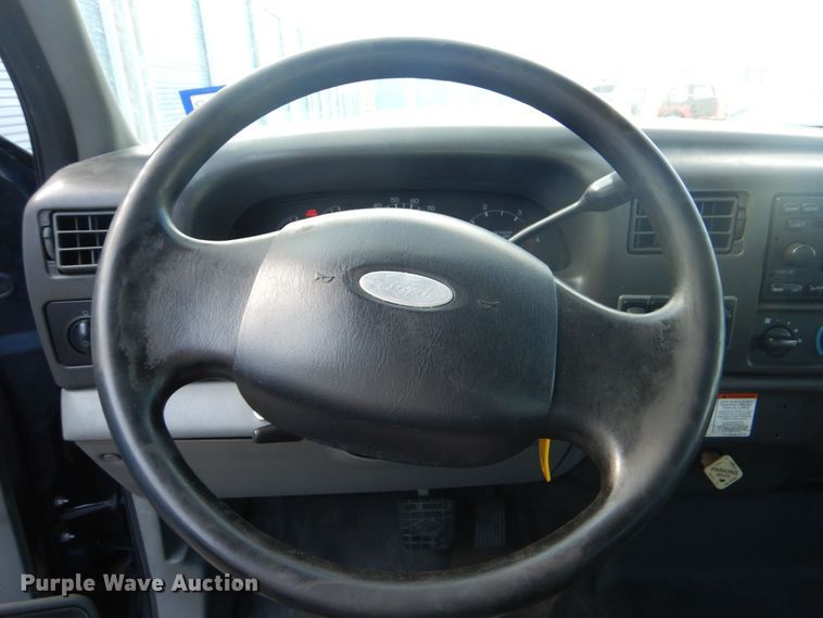 image for item DO1484 2010 Ford F650 Super Duty  SuperCab rollback truck