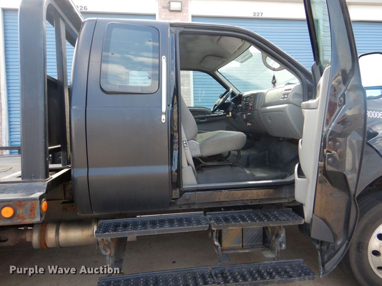 image for item DO1484 2010 Ford F650 Super Duty  SuperCab rollback truck