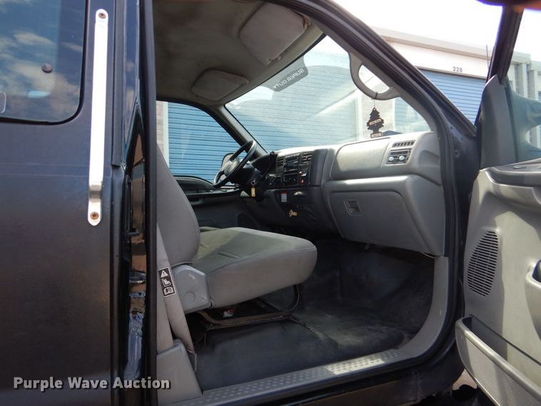 image for item DO1484 2010 Ford F650 Super Duty  SuperCab rollback truck