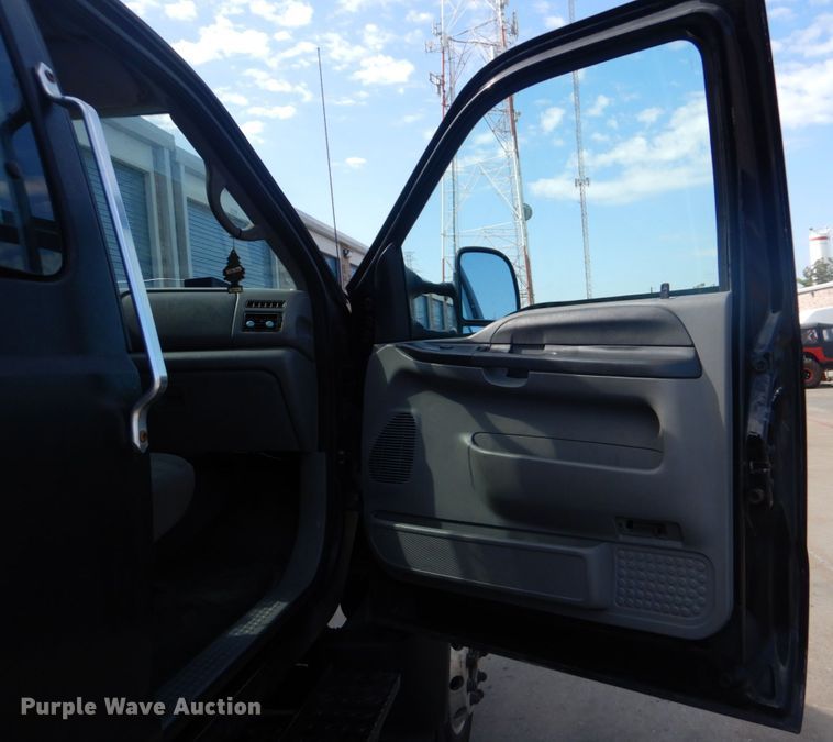 image for item DO1484 2010 Ford F650 Super Duty  SuperCab rollback truck