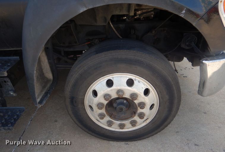 image for item DO1484 2010 Ford F650 Super Duty  SuperCab rollback truck