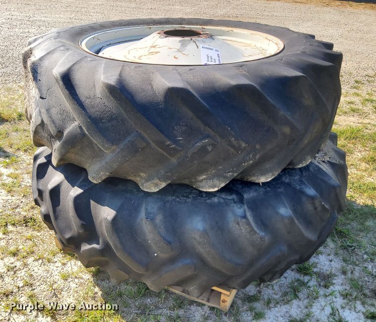 image for item DR0938 (2) Goodyear Traction Sure Grip wheels and tires