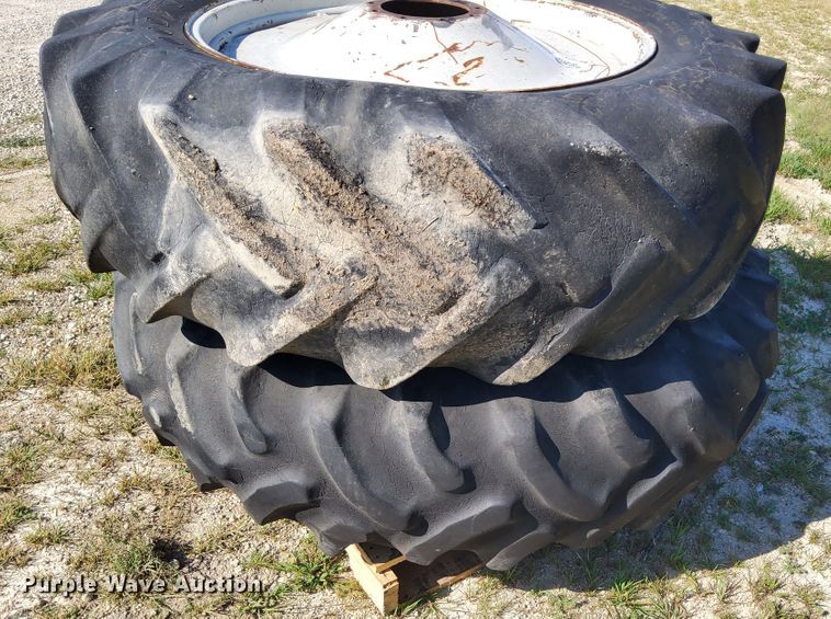 image for item DR0938 (2) Goodyear Traction Sure Grip wheels and tires