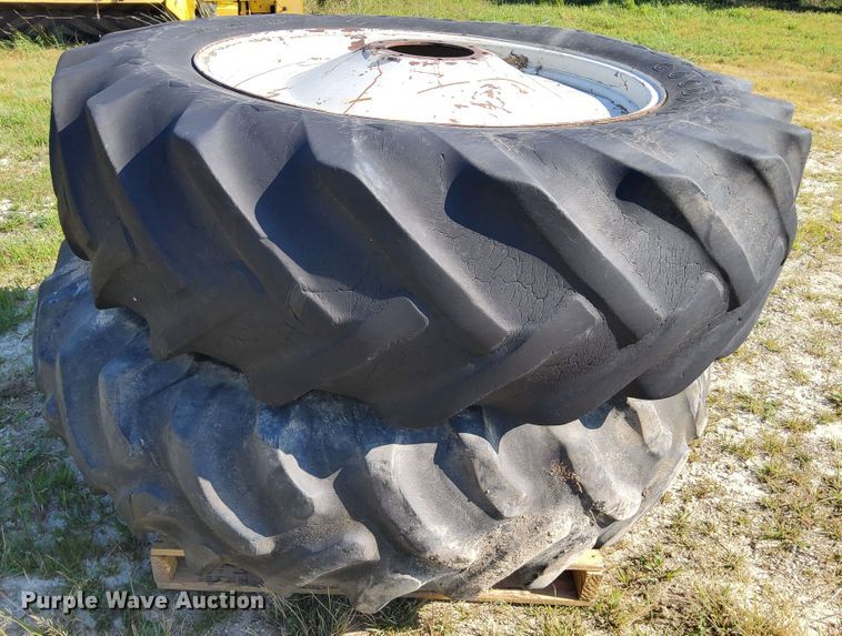 image for item DR0938 (2) Goodyear Traction Sure Grip wheels and tires