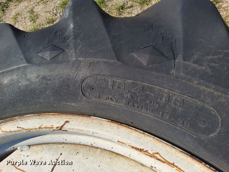 image for item DR0938 (2) Goodyear Traction Sure Grip wheels and tires