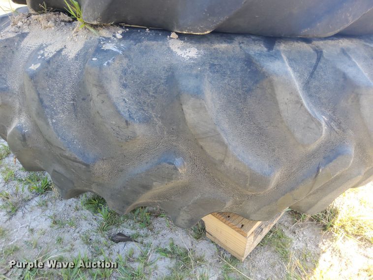 image for item DR0938 (2) Goodyear Traction Sure Grip wheels and tires