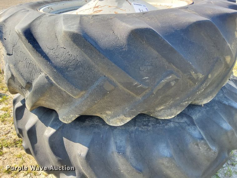 image for item DR0938 (2) Goodyear Traction Sure Grip wheels and tires