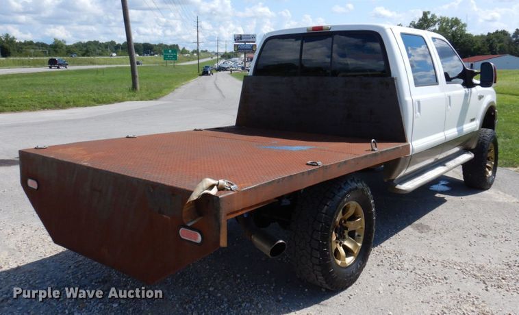 image for item KF9619 2006 Ford F350 Super Duty Lariat King Ranch  Crew Cab flatbed pickup truck
