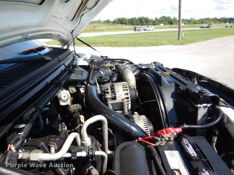 image for item KF9619 2006 Ford F350 Super Duty Lariat King Ranch  Crew Cab flatbed pickup truck