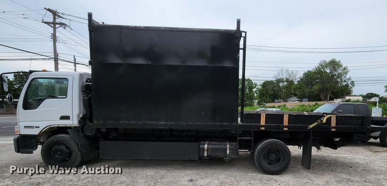 image for item MK9059 2006 Ford LCF 550  flatbed truck