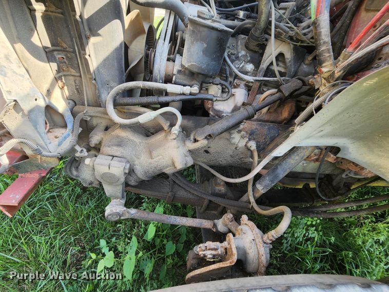 image for item MK9070 1992 Ford F700  flatbed truck