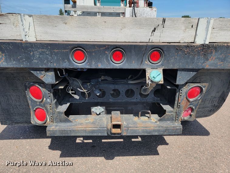 image for item JC9668 2003 GMC W4500  flatbed truck