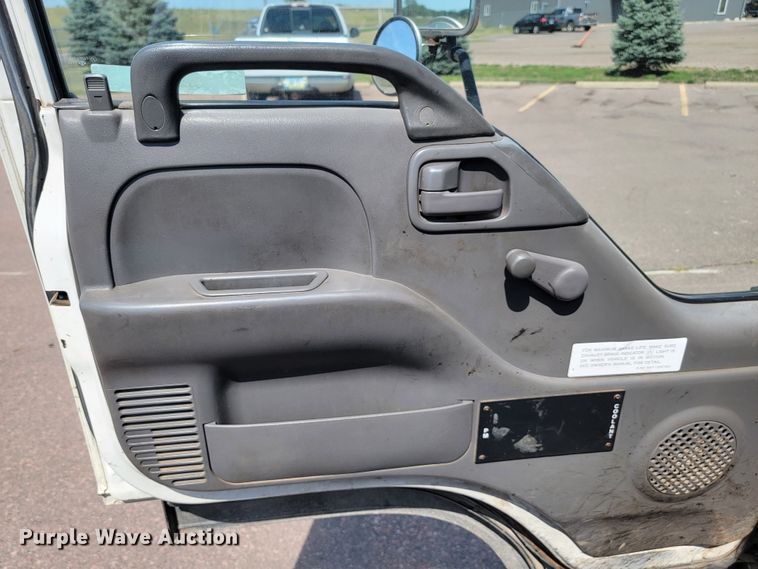 image for item JC9668 2003 GMC W4500  flatbed truck