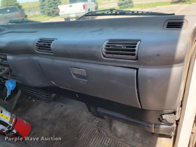 image for item JC9668 2003 GMC W4500  flatbed truck