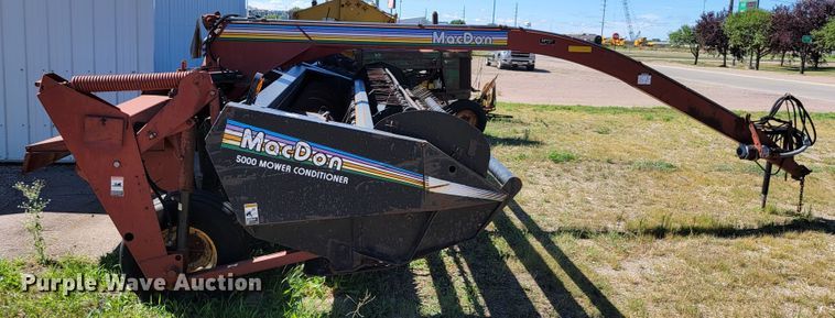 image for item JC9689 1999 MacDon 5000  windrower
