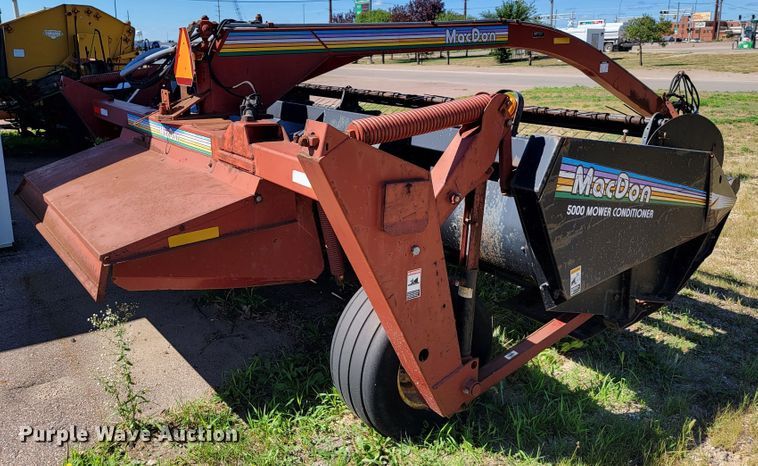 image for item JC9689 1999 MacDon 5000  windrower