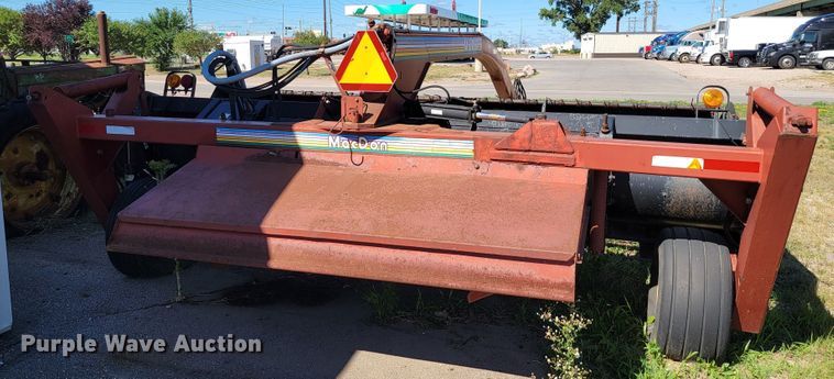 image for item JC9689 1999 MacDon 5000  windrower