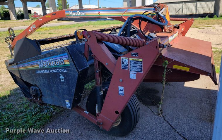image for item JC9689 1999 MacDon 5000  windrower