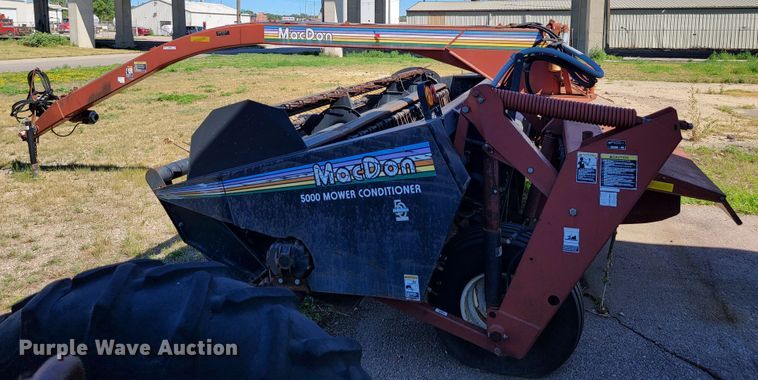 image for item JC9689 1999 MacDon 5000  windrower