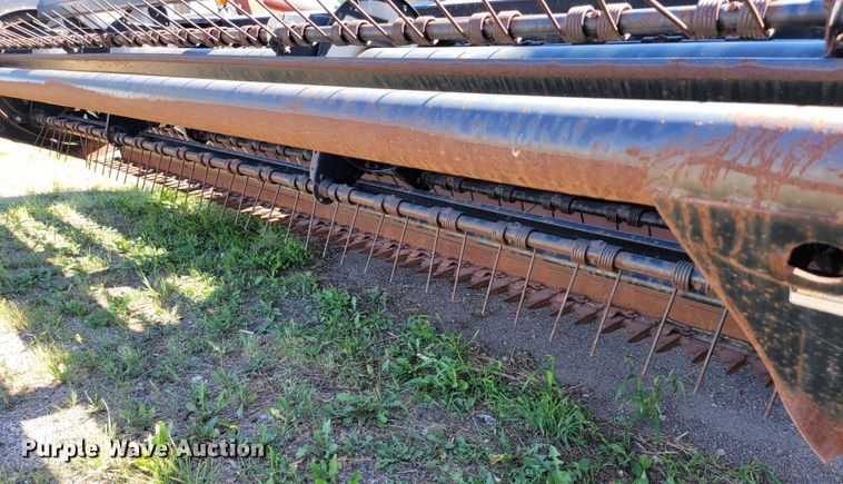 image for item JC9689 1999 MacDon 5000  windrower