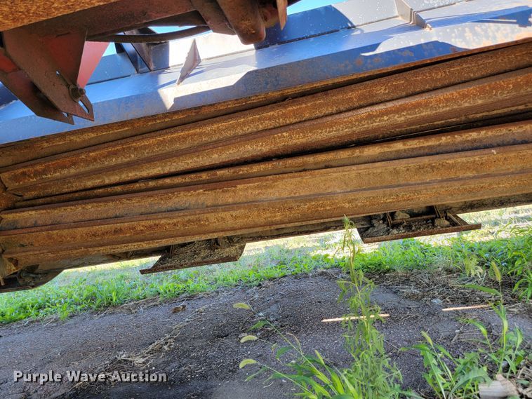 image for item JC9689 1999 MacDon 5000  windrower