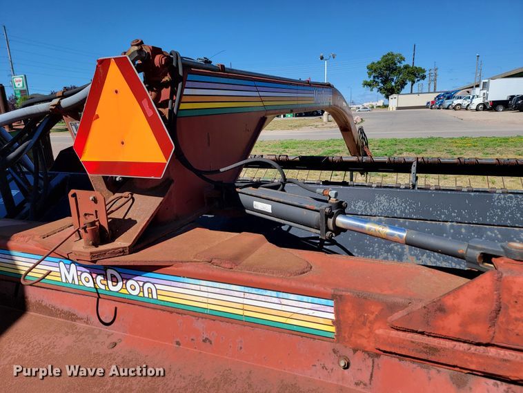 image for item JC9689 1999 MacDon 5000  windrower