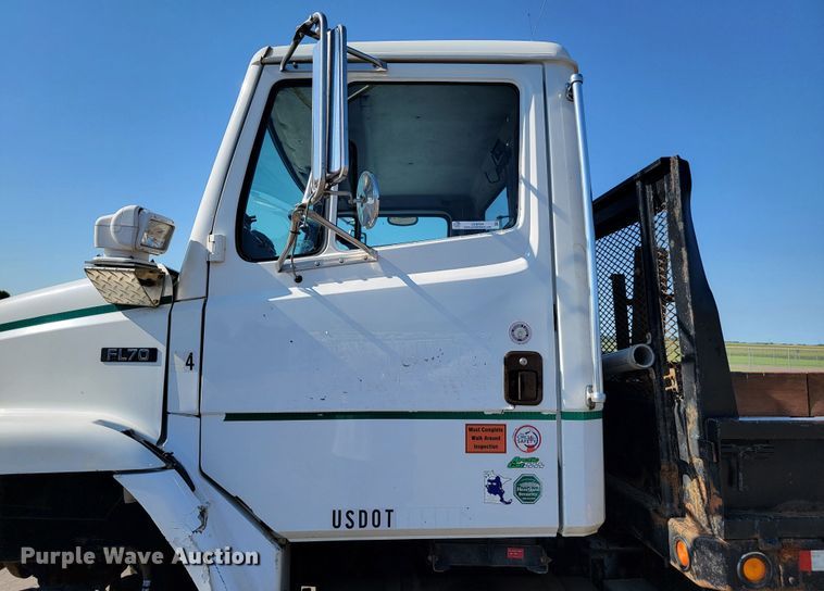 image for item JC9704 2001 Freightliner FL70  flatbed truck